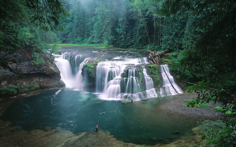 Person Fishing by Waterfall — Green, Serene