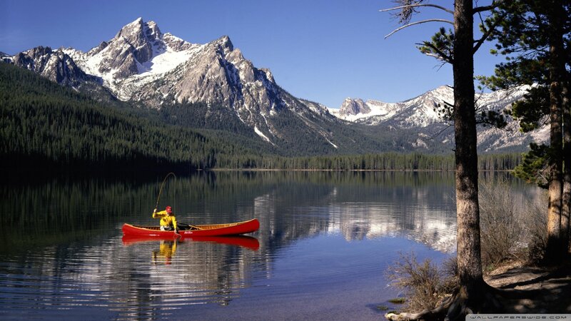 Person Fishing in Canoe