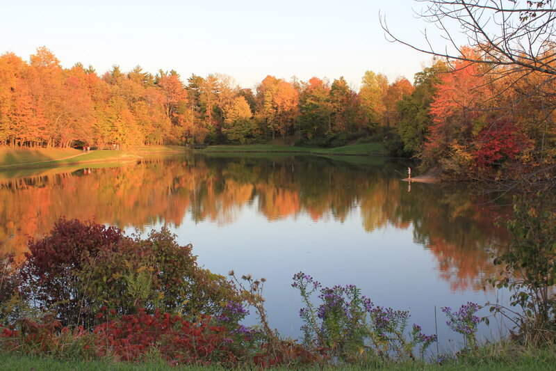 Person Fishing on Lake