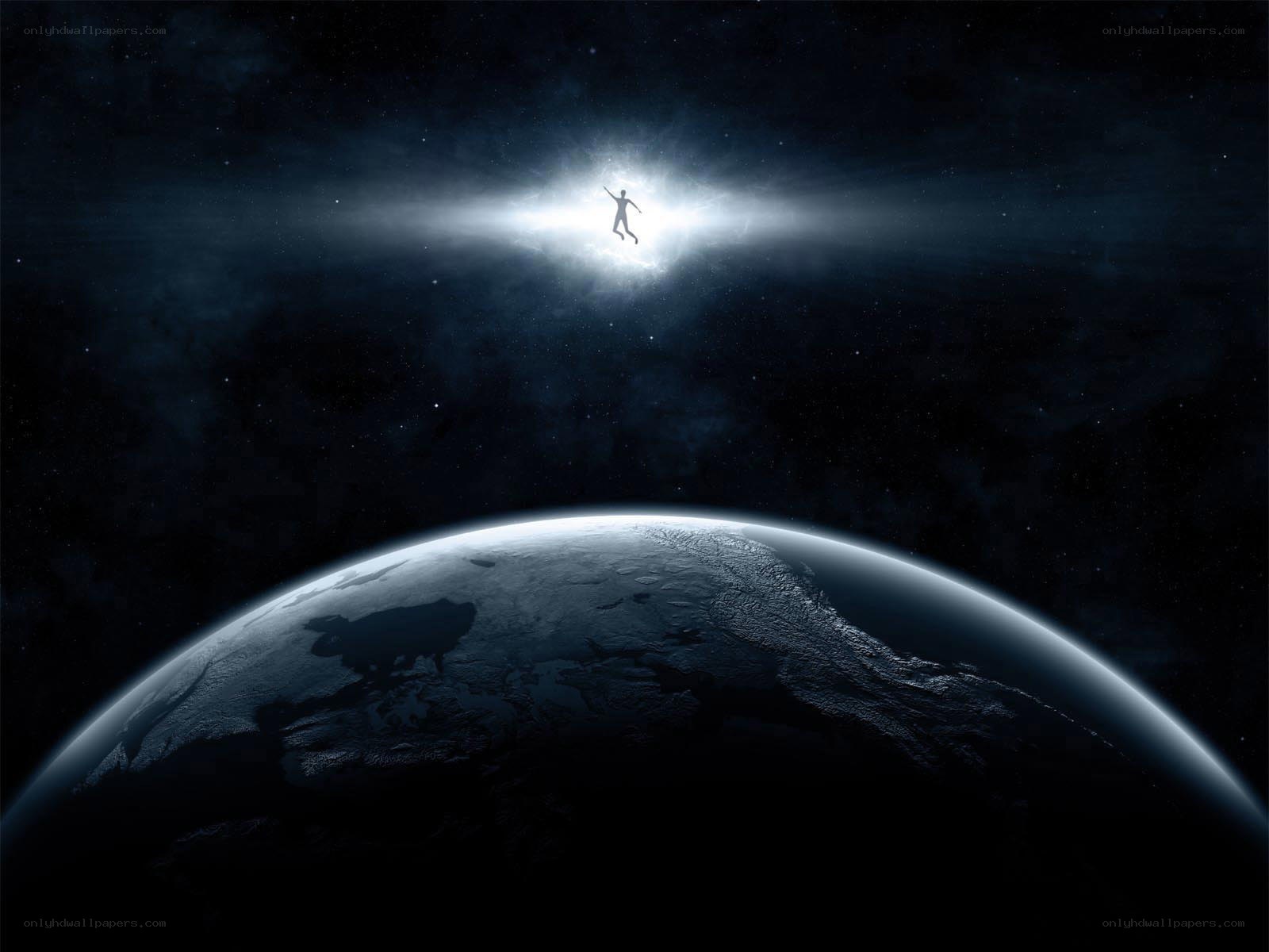 person floating above earth