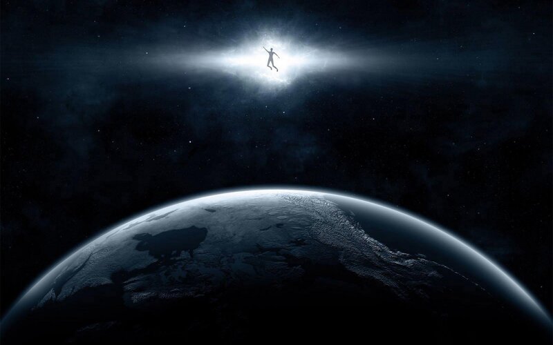 person floating above Earth