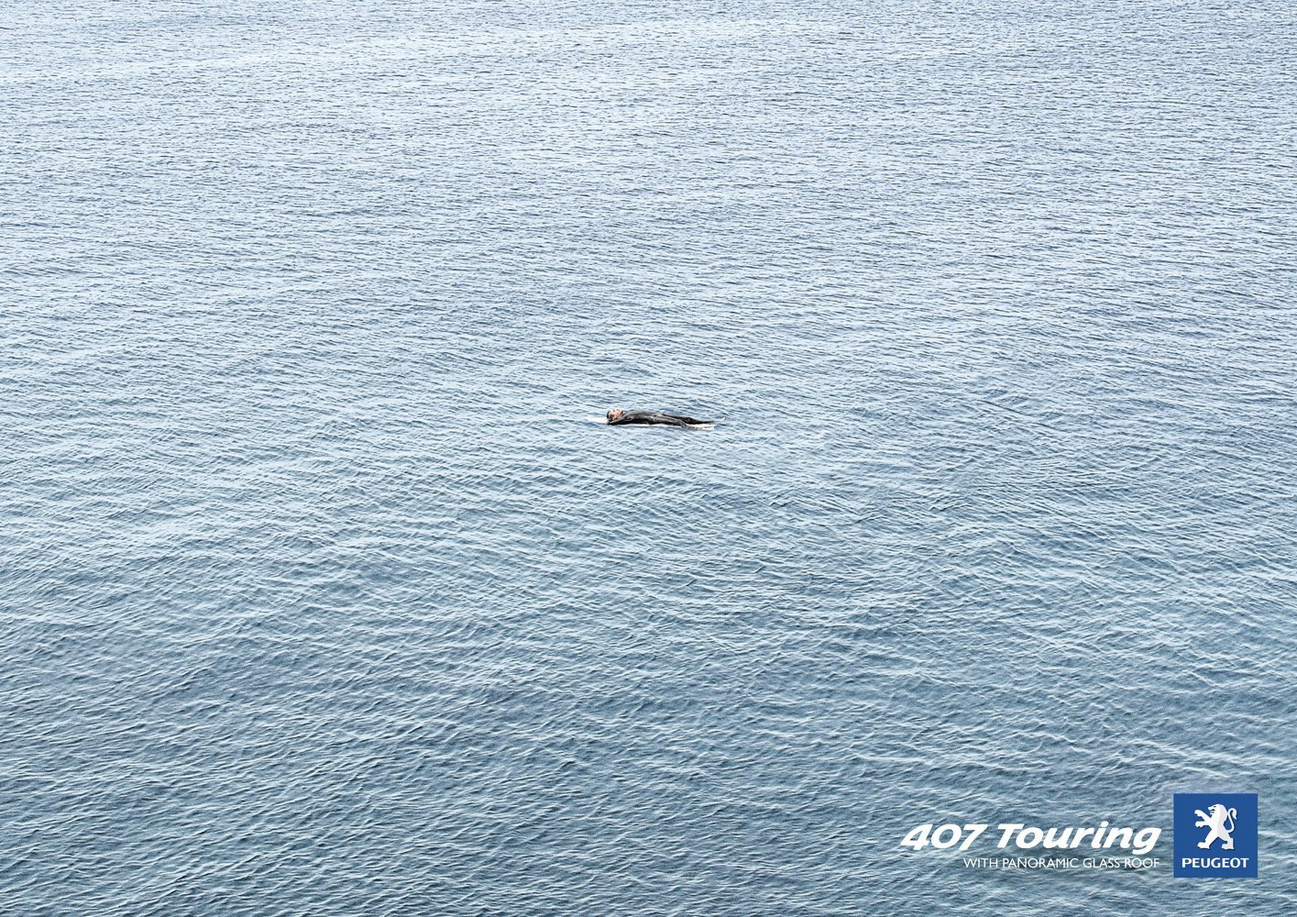 person floating in the ocean