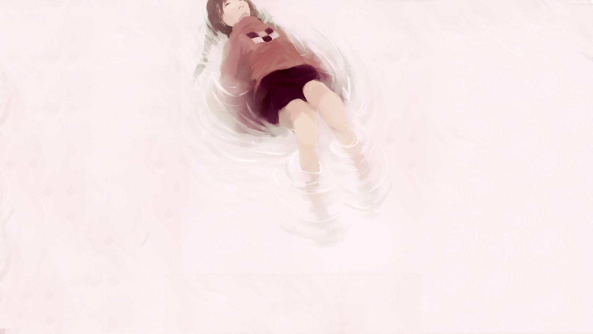 person floating in water