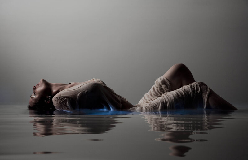 person floating in water