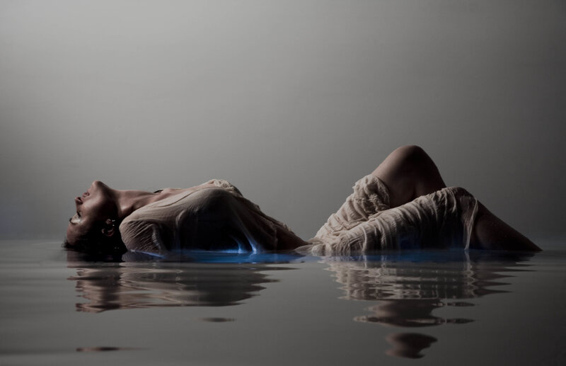 Person Floating in Water — Gray