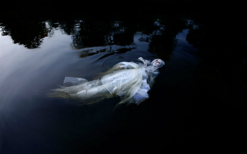 Person Floating in Water — White