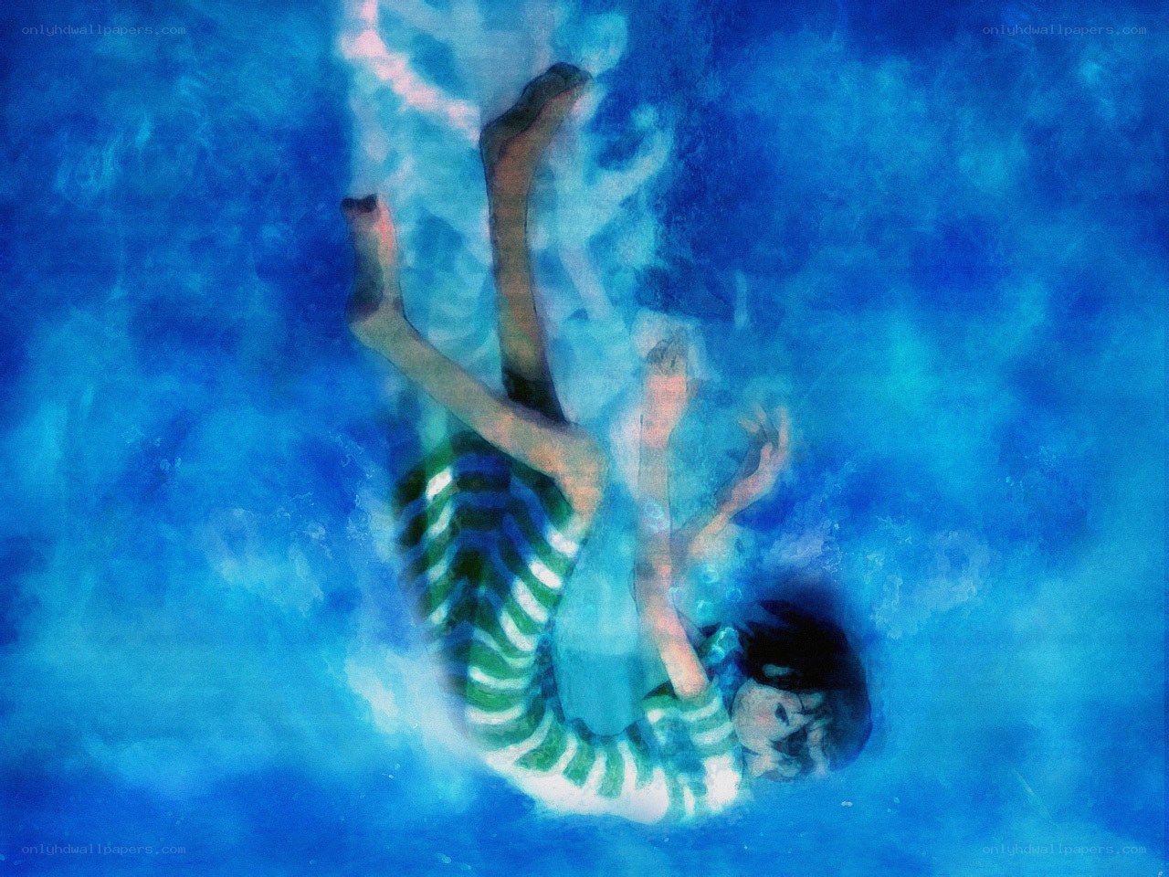 person floating underwater