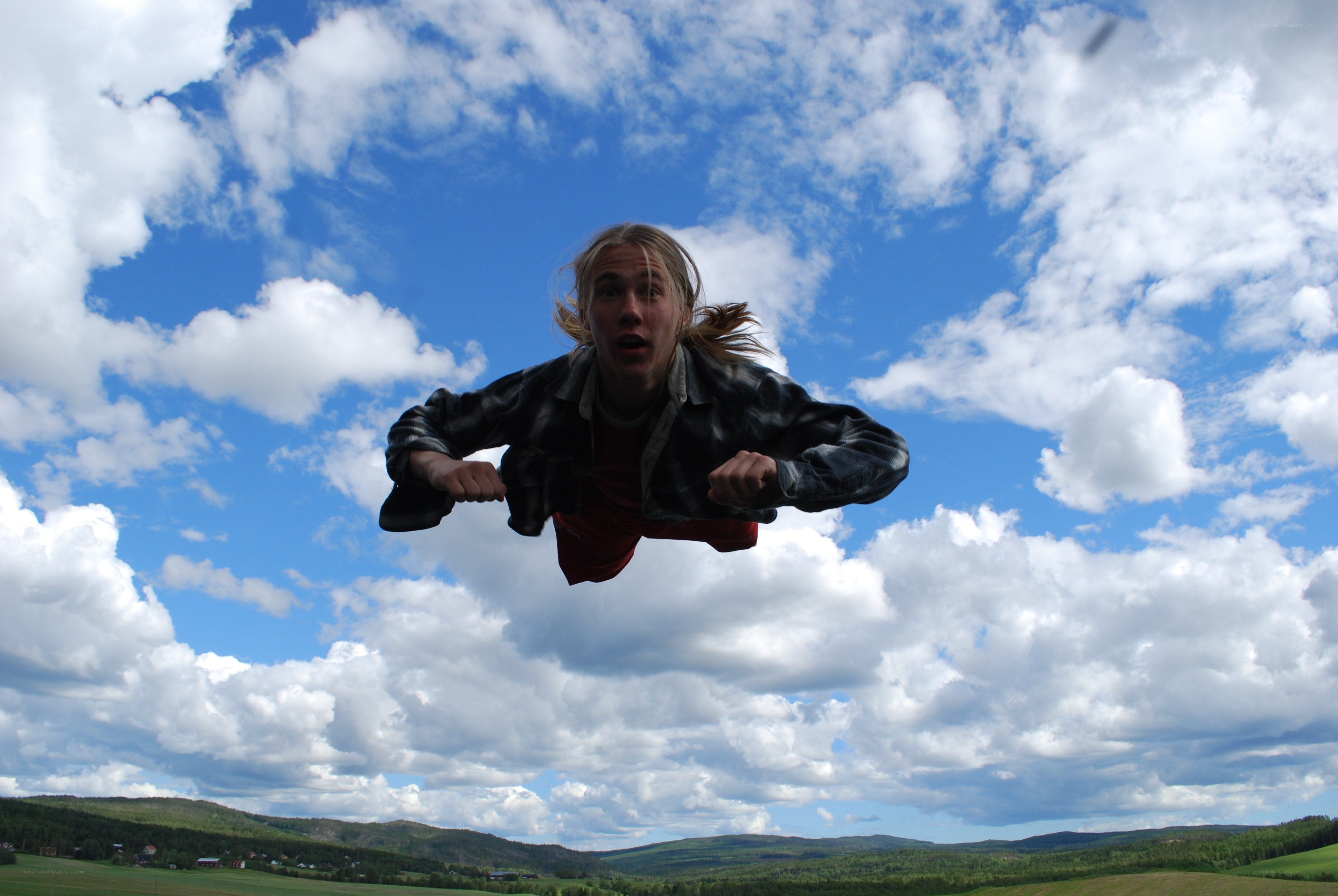 person flying in sky