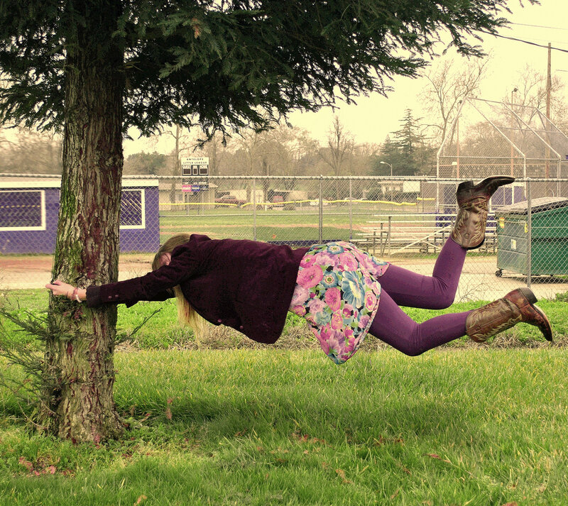 Person Hanging from Tree — Green