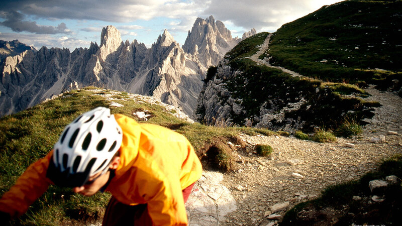 Person Hiking in Mountains