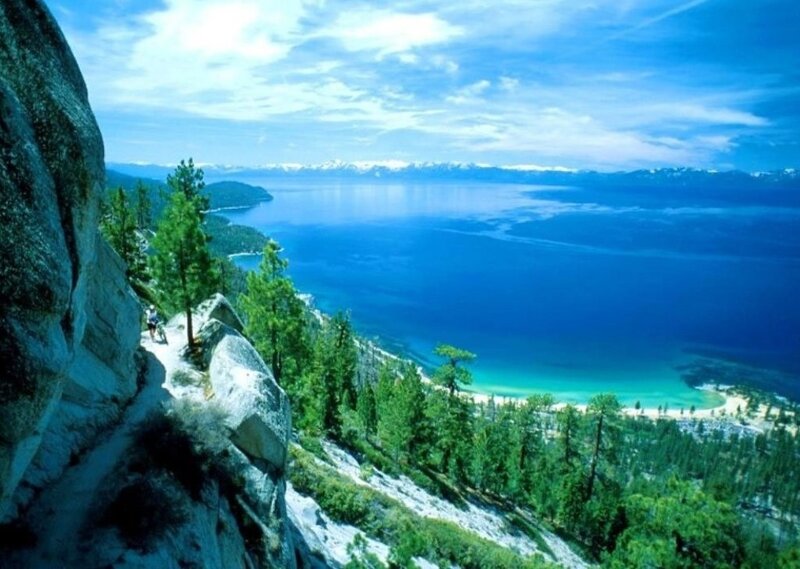Person Hiking on Cliff — Blue