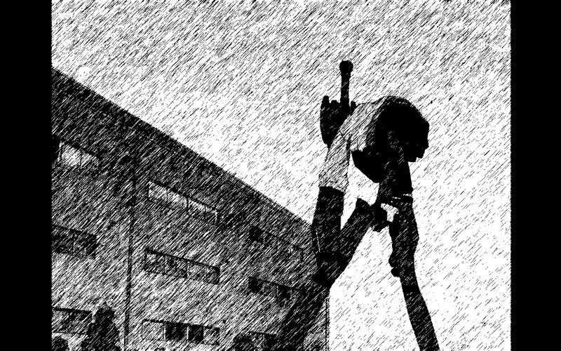 person holding a bat in rain