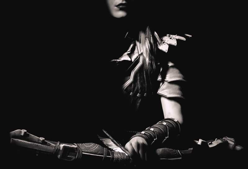 Person Holding a Bow — Black
