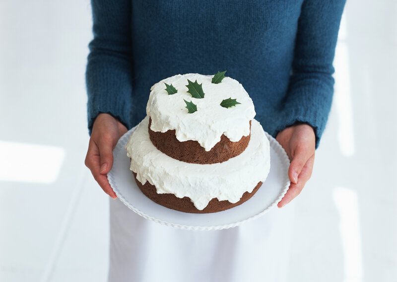 person holding a cake