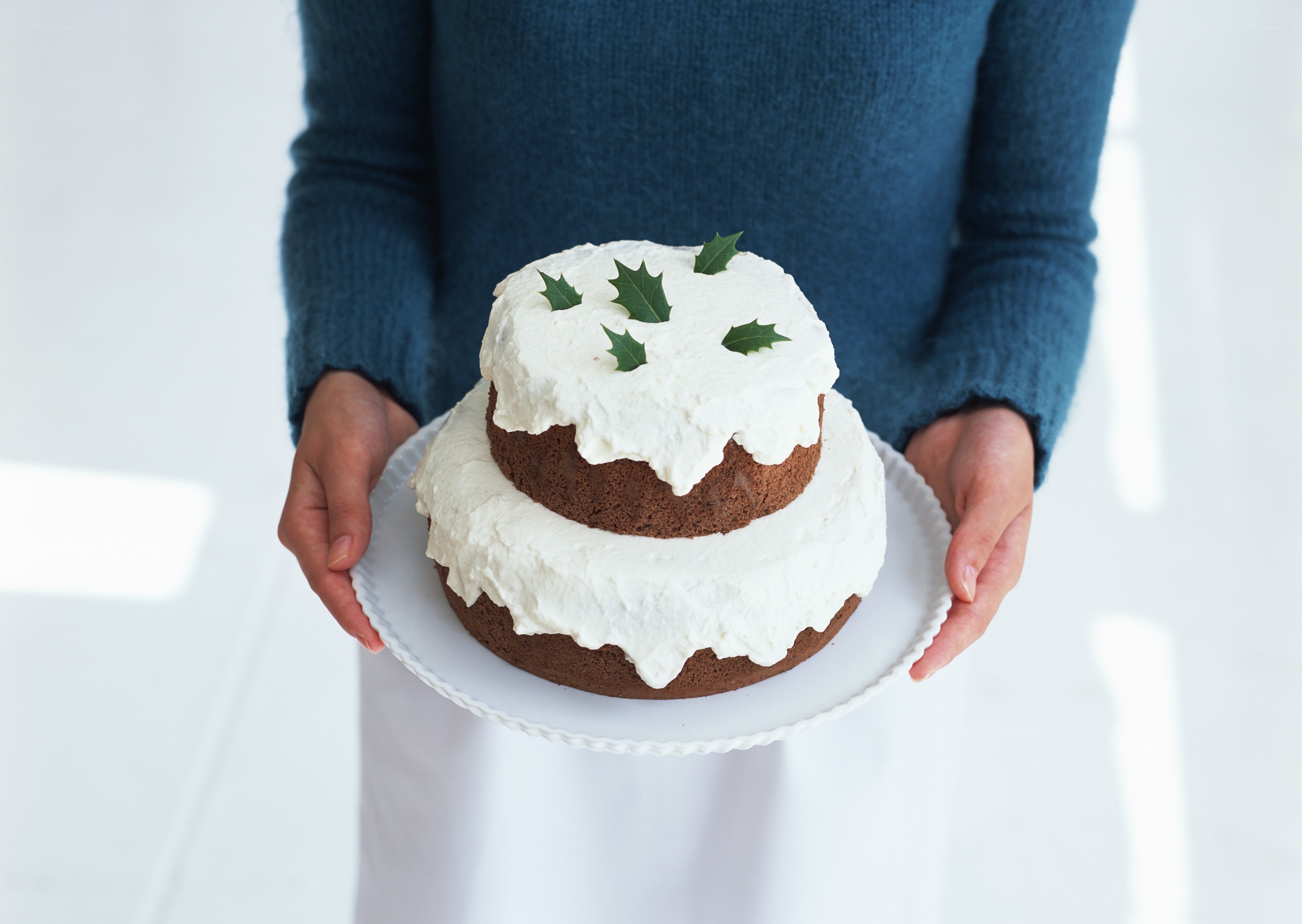 person holding a cake