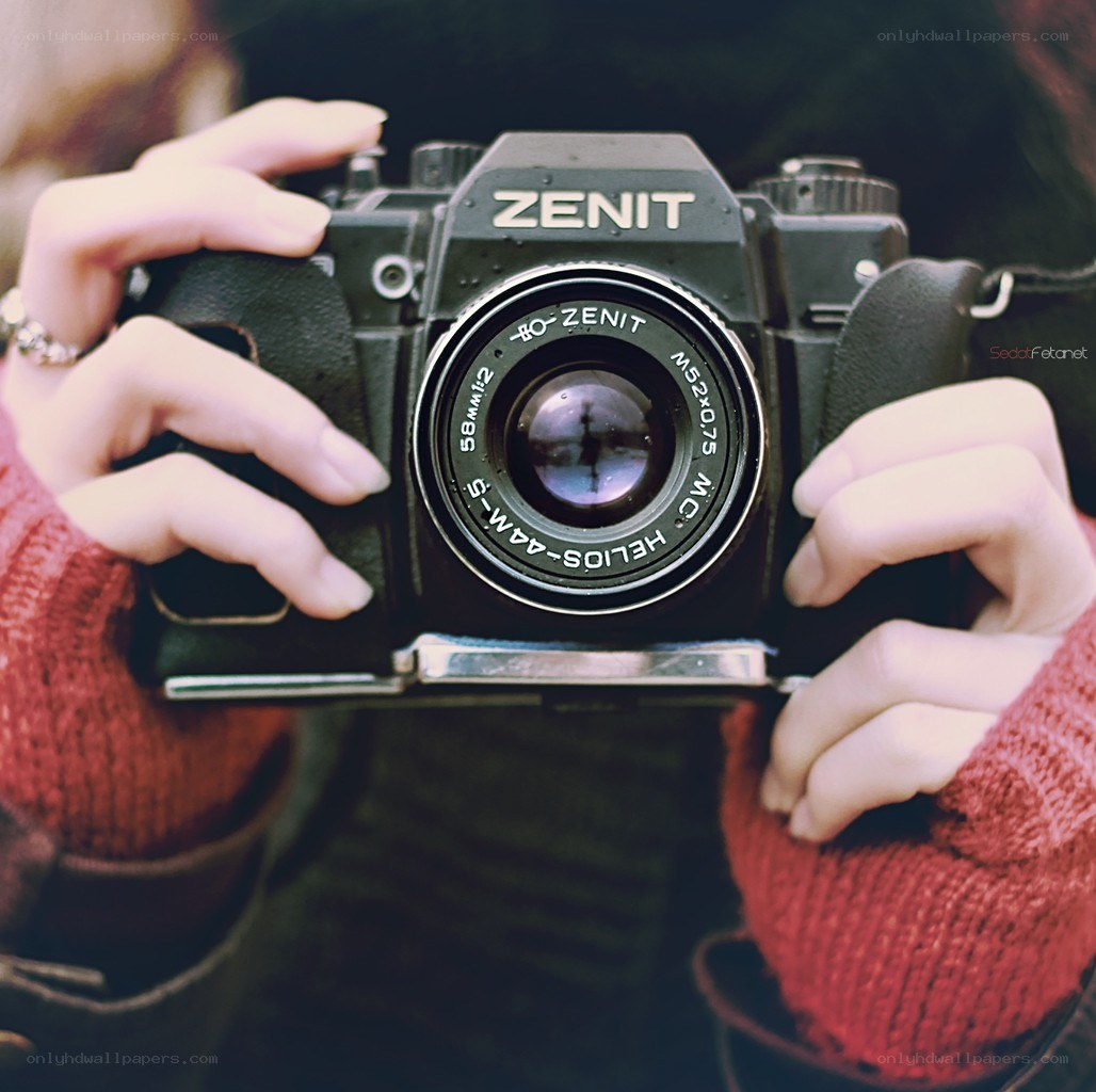 person holding a camera