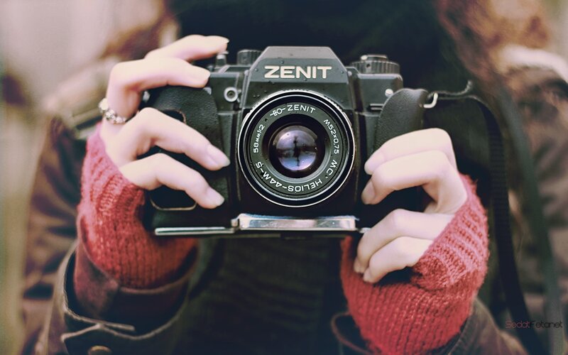 person holding a camera