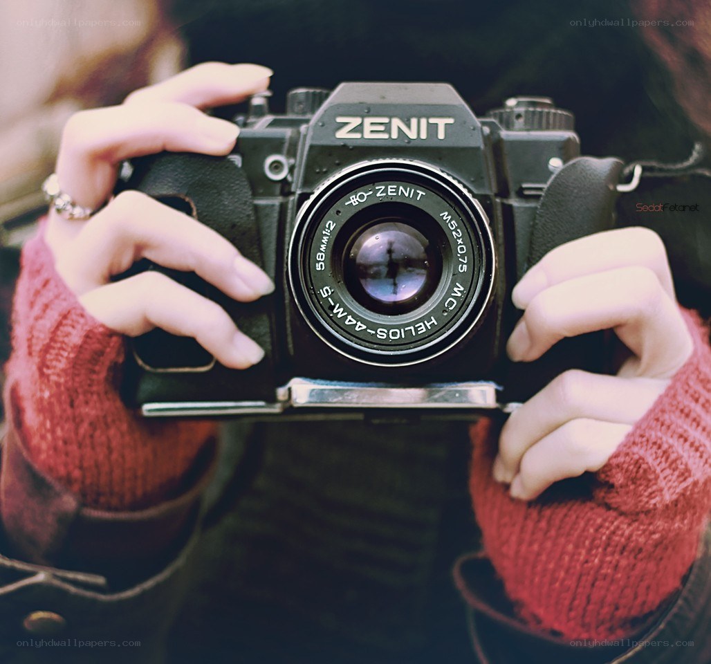 person holding a camera