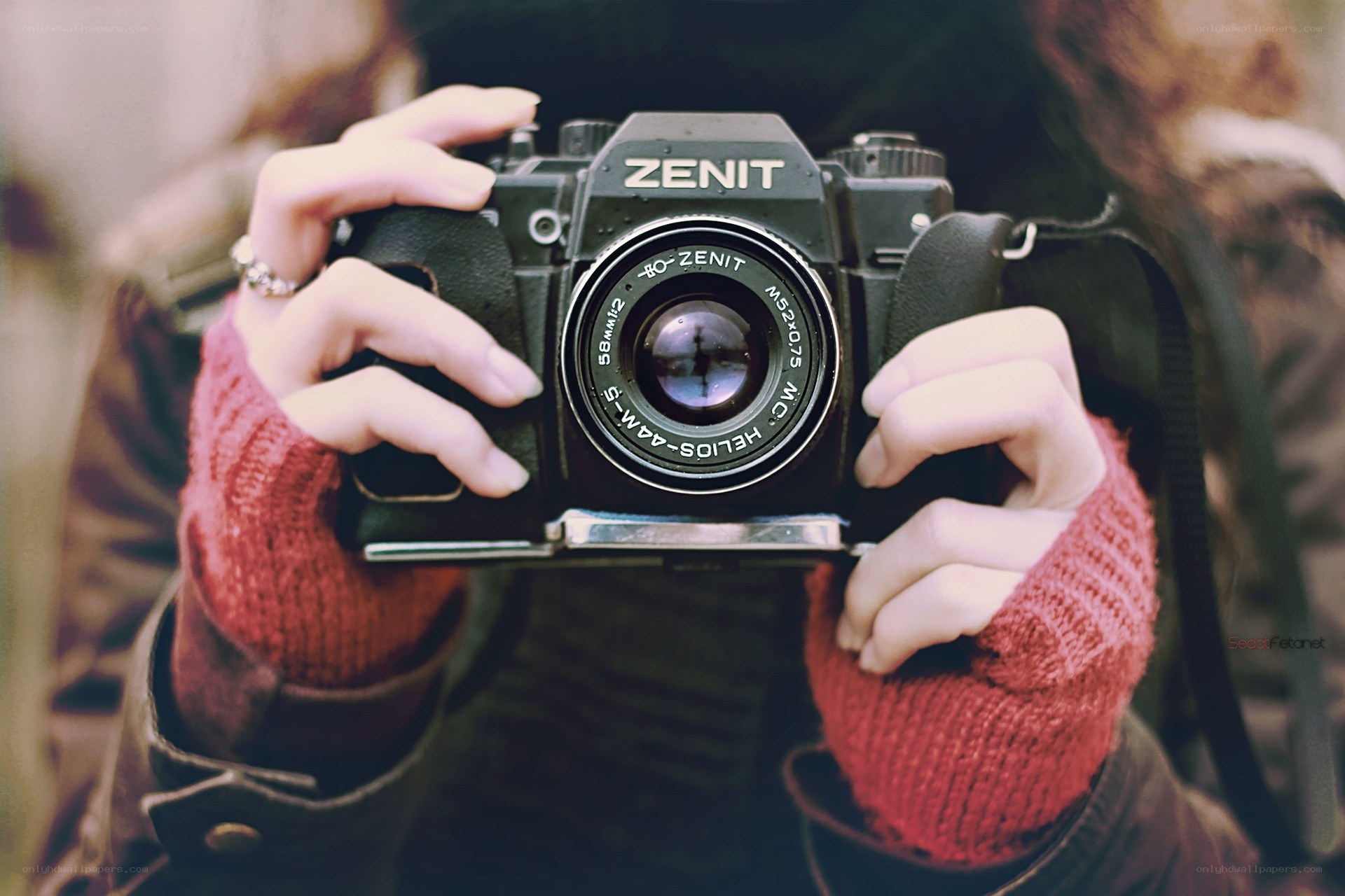 person holding a camera