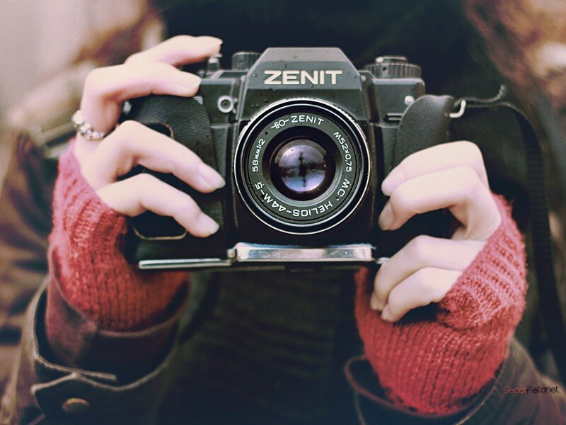 person holding a camera