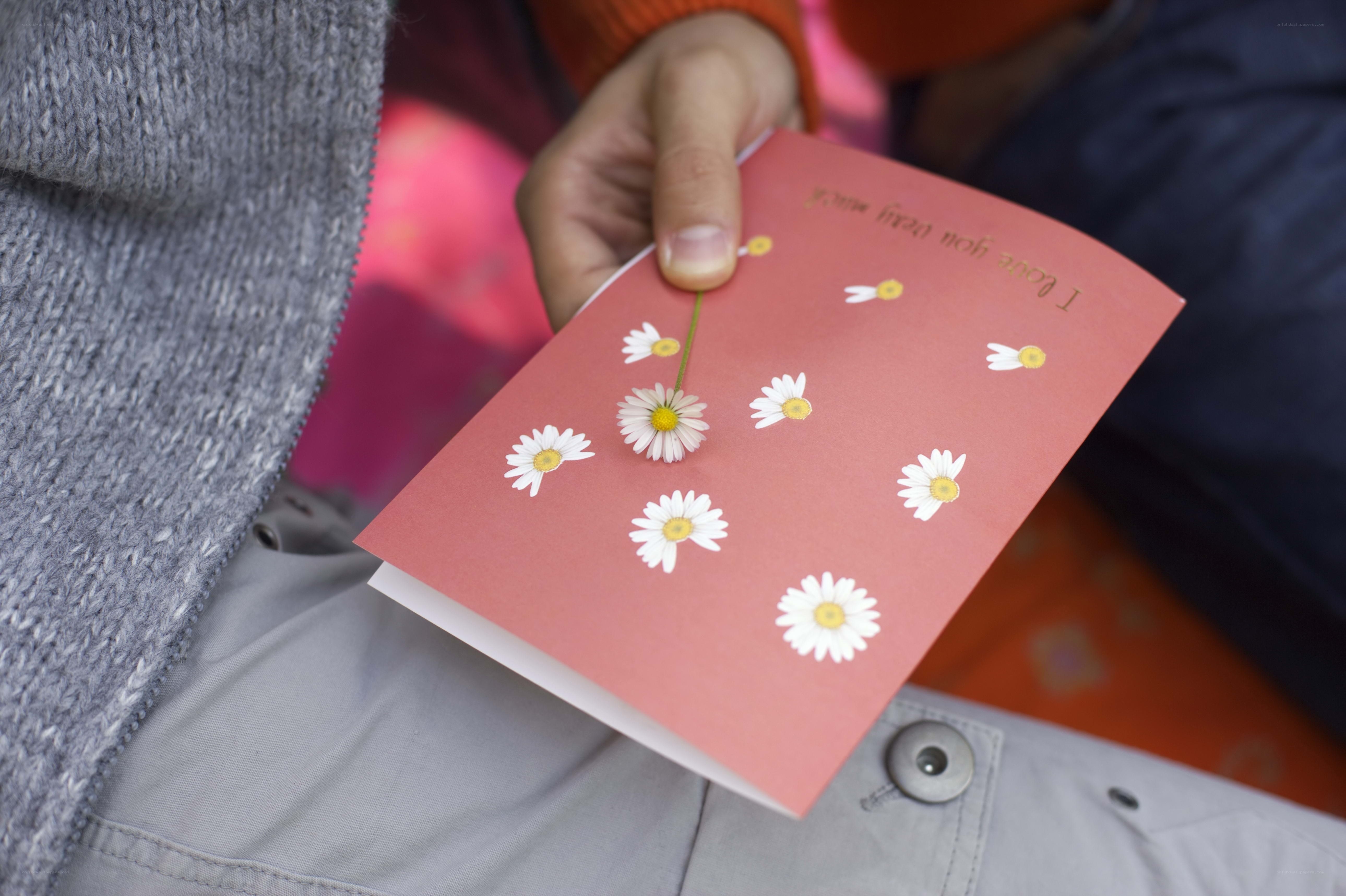 person holding a card