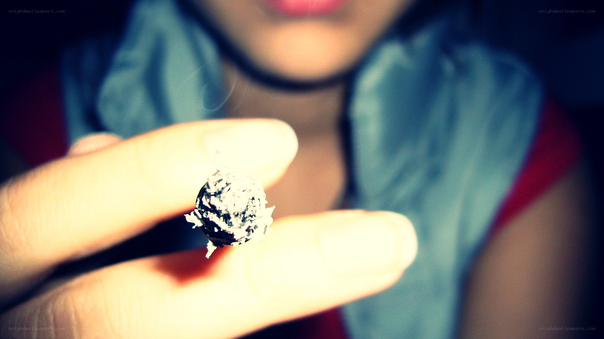 person holding a cigarette