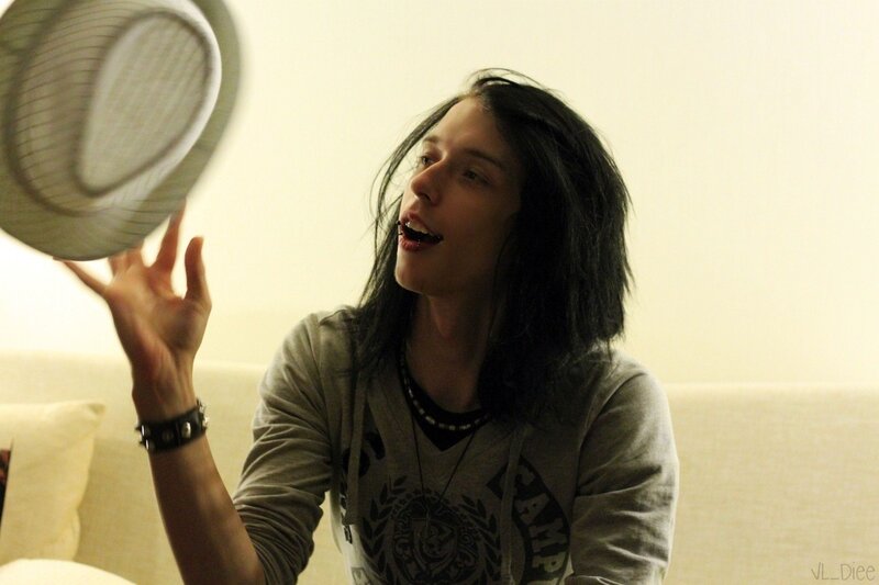 person holding a hat