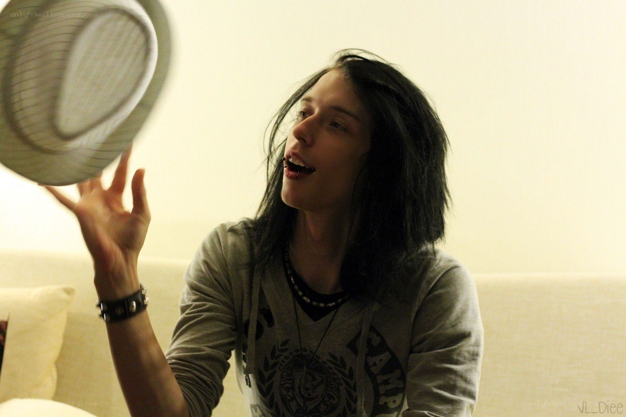 person holding a hat
