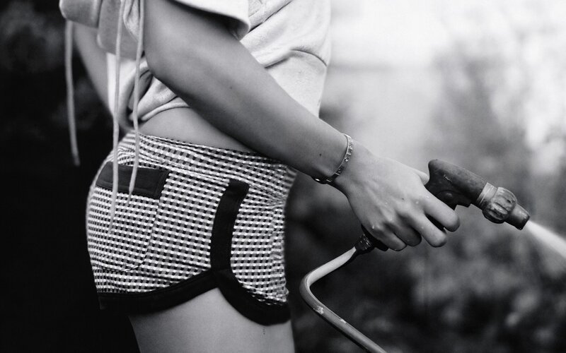 person holding a hose