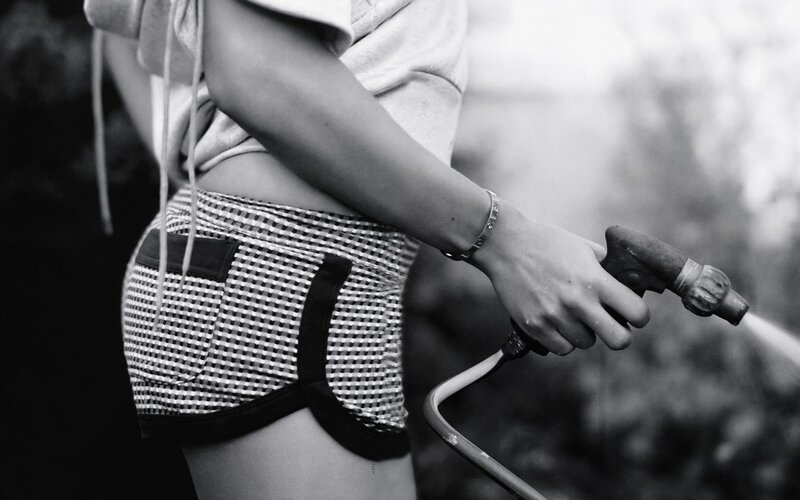 person holding a hose