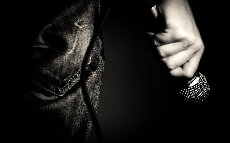 person holding a microphone