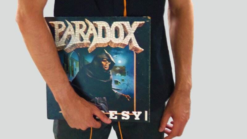 person holding a record album