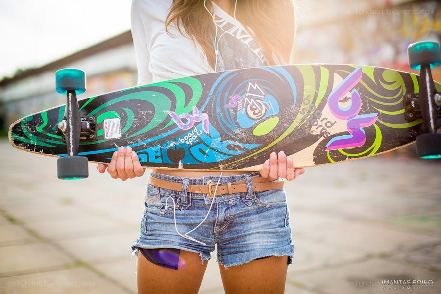 person holding a skateboard