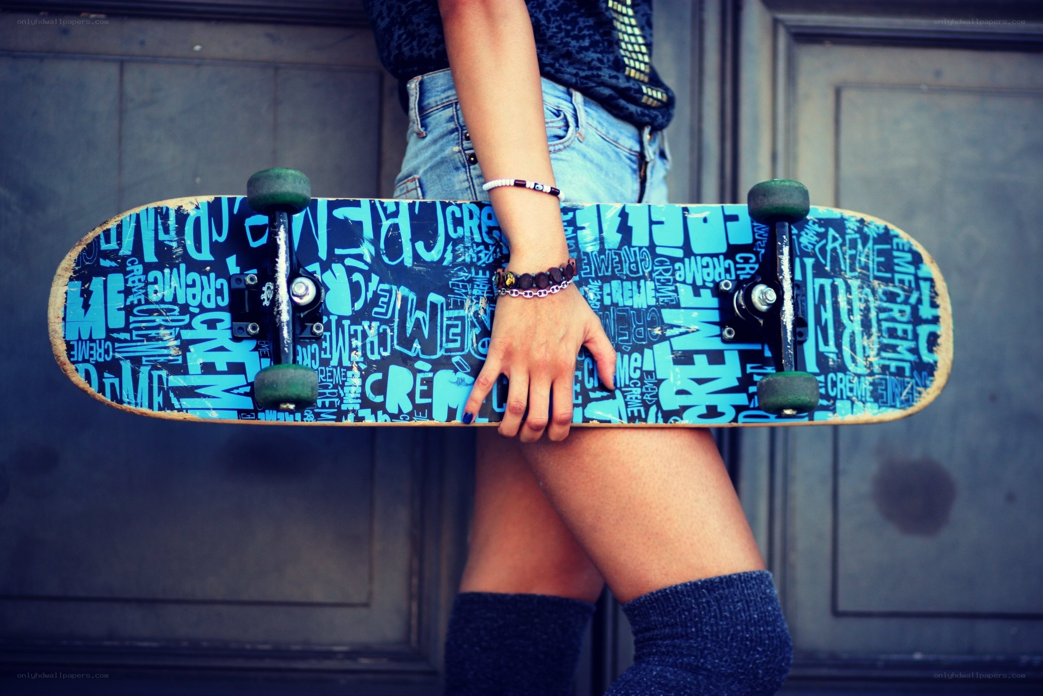 person holding a skateboard