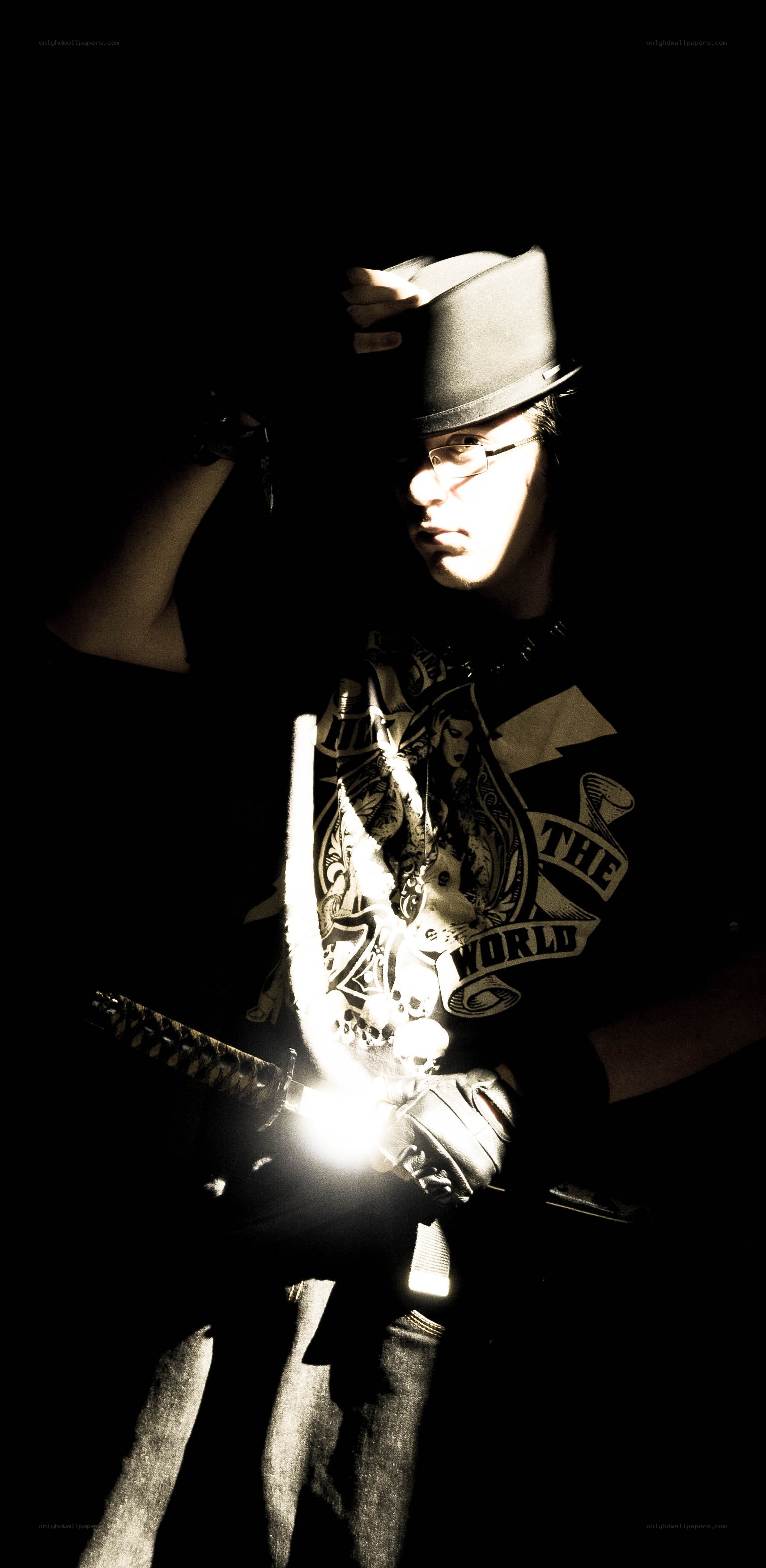 person holding a sword
