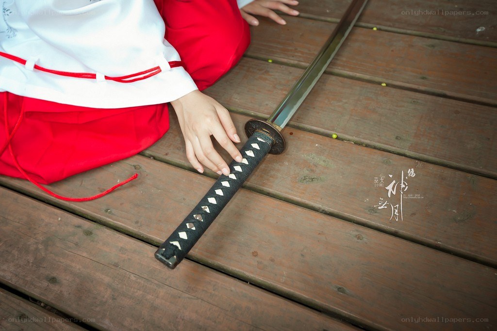 person holding a sword