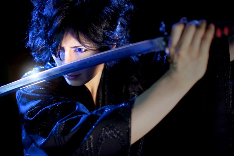 Person Holding a Sword — Black, Dramatic, Night