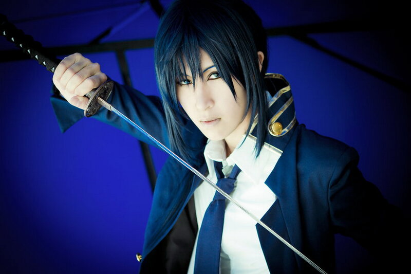 Person Holding a Sword — Blue