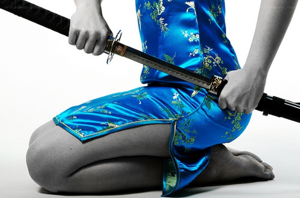person holding a sword
