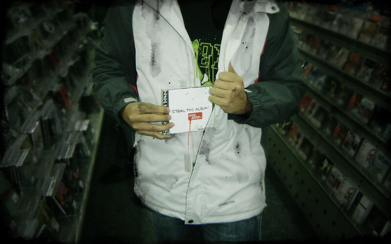 person holding album in store