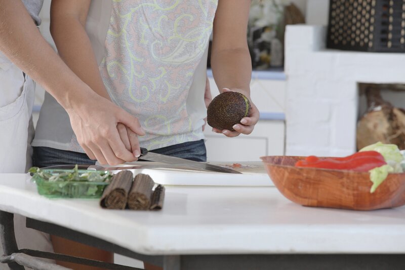 Person Holding Avocado