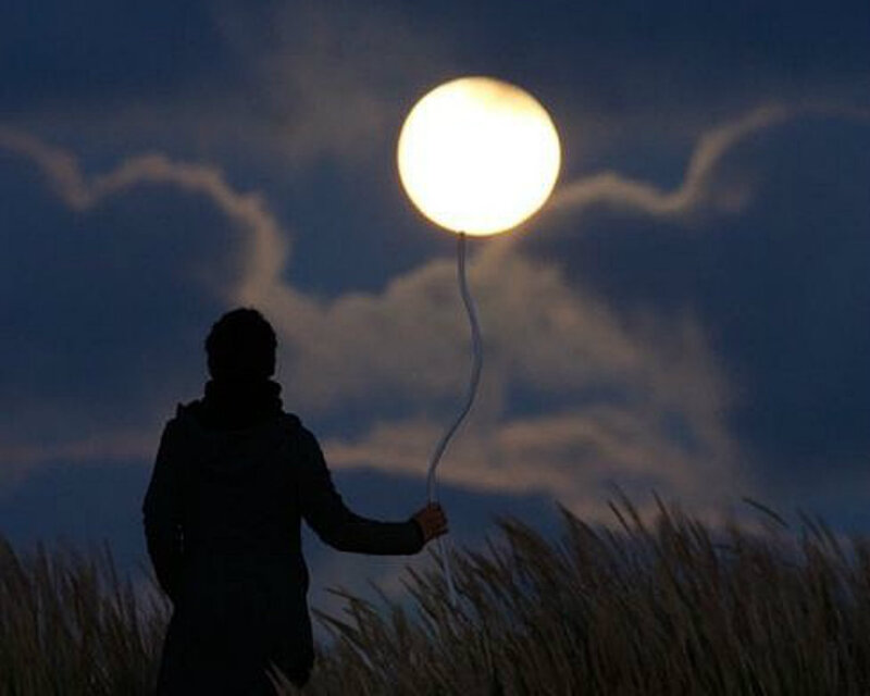 Person Holding Balloon — Blue, Dramatic