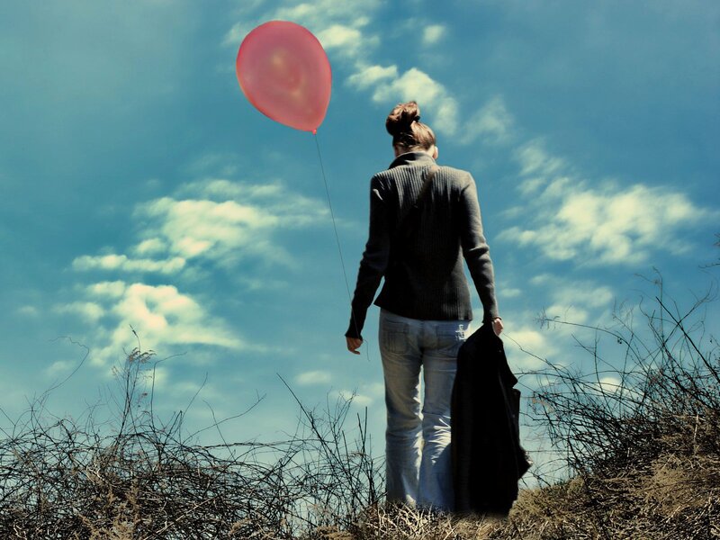 Person Holding Balloon