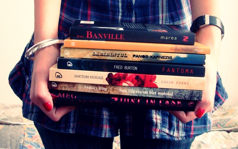 Person Holding Books — Blue, Calm