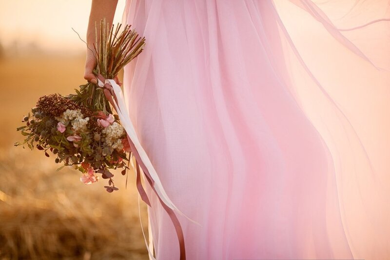 Person Holding Bouquet — Pink, Serene, Sunset