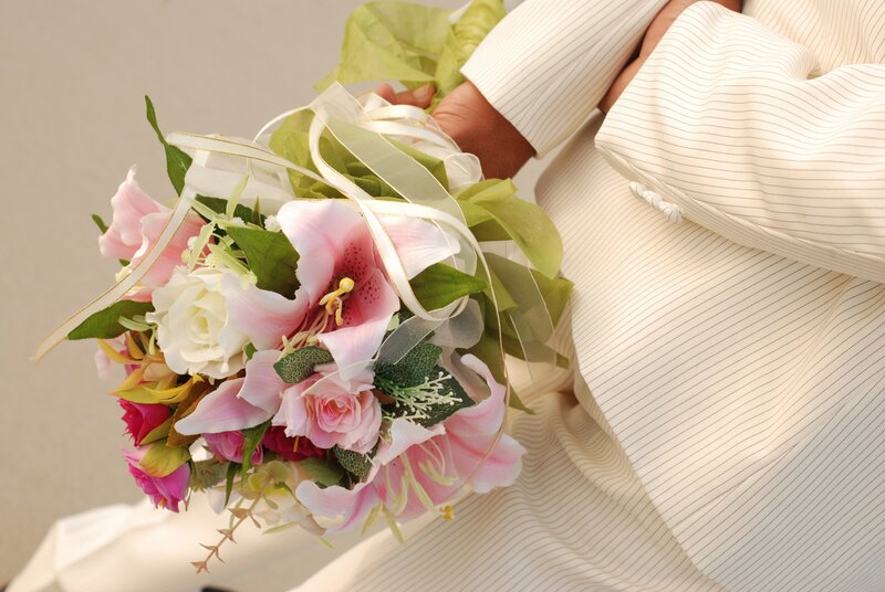 Person Holding Bouquet — Pink
