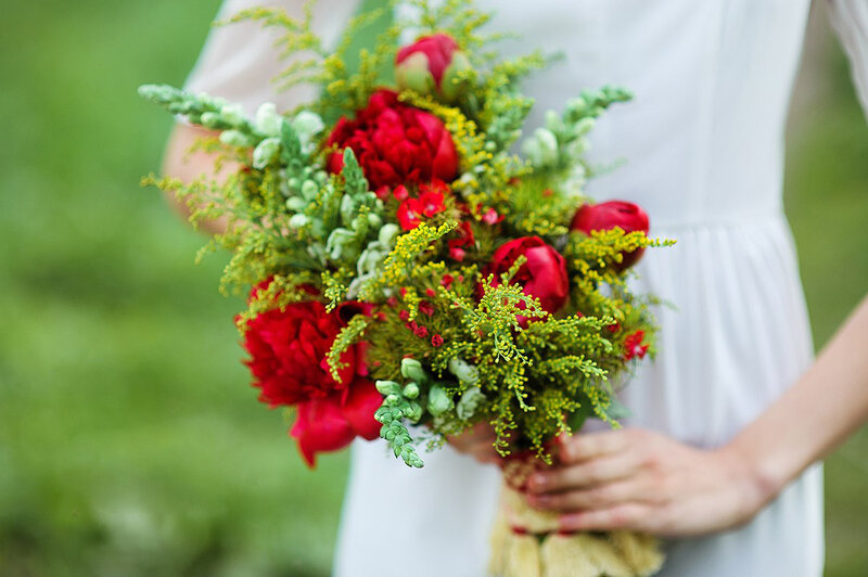 Person Holding Bouquet — Red