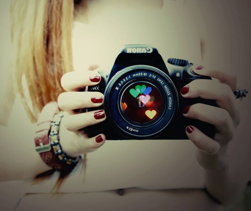 Person Holding Camera — Black, Calm, Photograph
