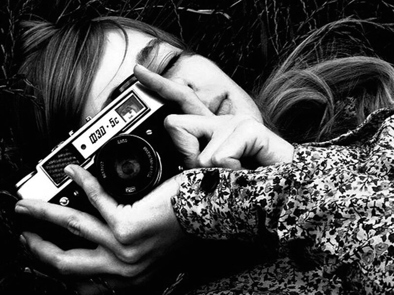 Person Holding Camera — Black, Calm