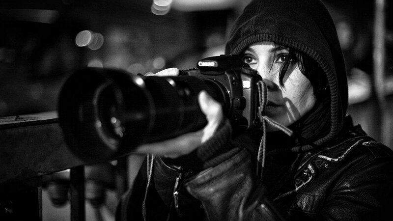 Person Holding Camera — Black, Dramatic